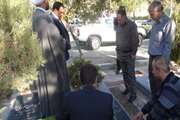 حضور جمعی از بسیجیان اداره   کل دامپزشکی در غبار روبی از مزار شهداء در هفته دولت 94